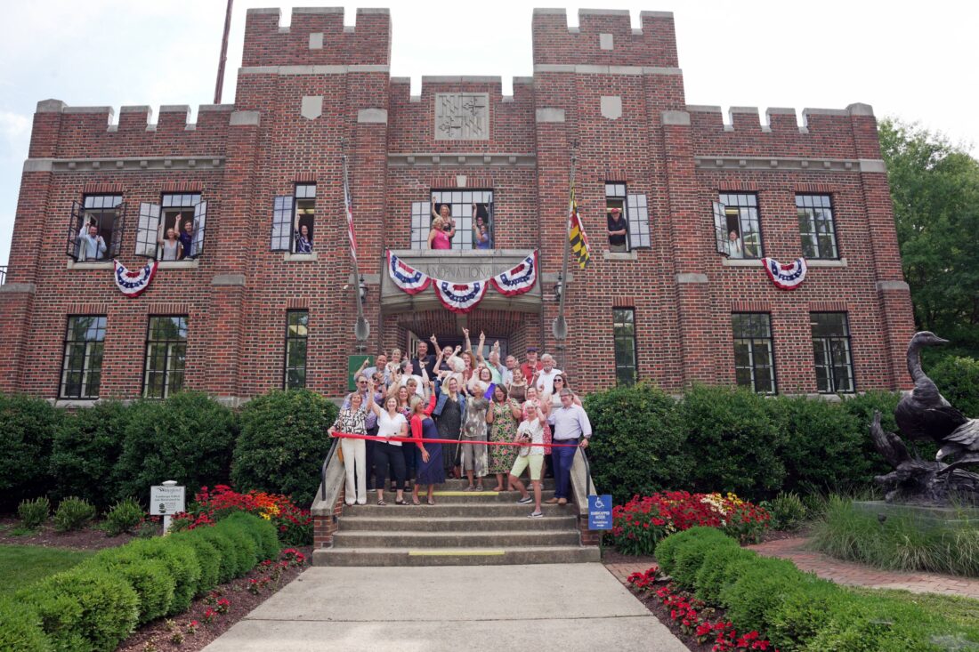 Community members, Waterfowl volunteers and donors on steps of Waterfowl Building/formerly Easton Armory on Harrison St
